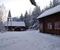 Bakkehuset med spisestua i forgrunnen, Stillhetens hus i bakgrunnen